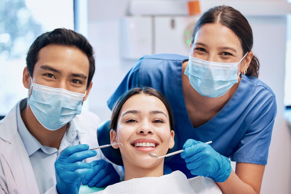 White Fillings in Ilford, Essex 4 dentists with patients smiling during dental treatment